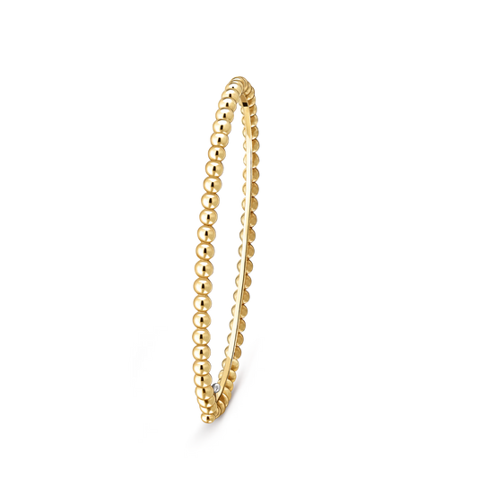 Perlée pearls of gold bracelet, 18K yellow gold, medium model.
