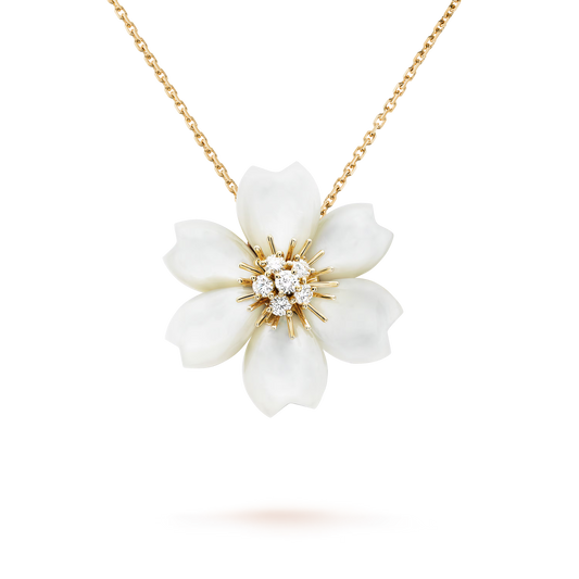 Rose de Noël clip pendant, small model, 18K yellow gold, white mother-of-pearl, round diamonds.