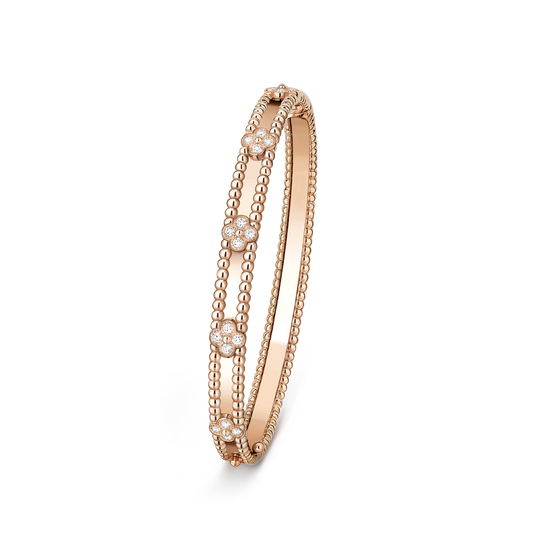 Perlée sweet clovers bracelet, 18K rose gold, round diamonds, medium model.