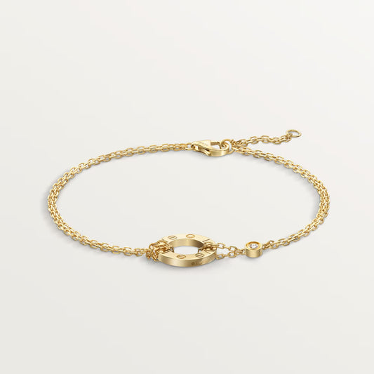 LOVE bracelet 18K yellow gold, on chain, 2 diamonds.