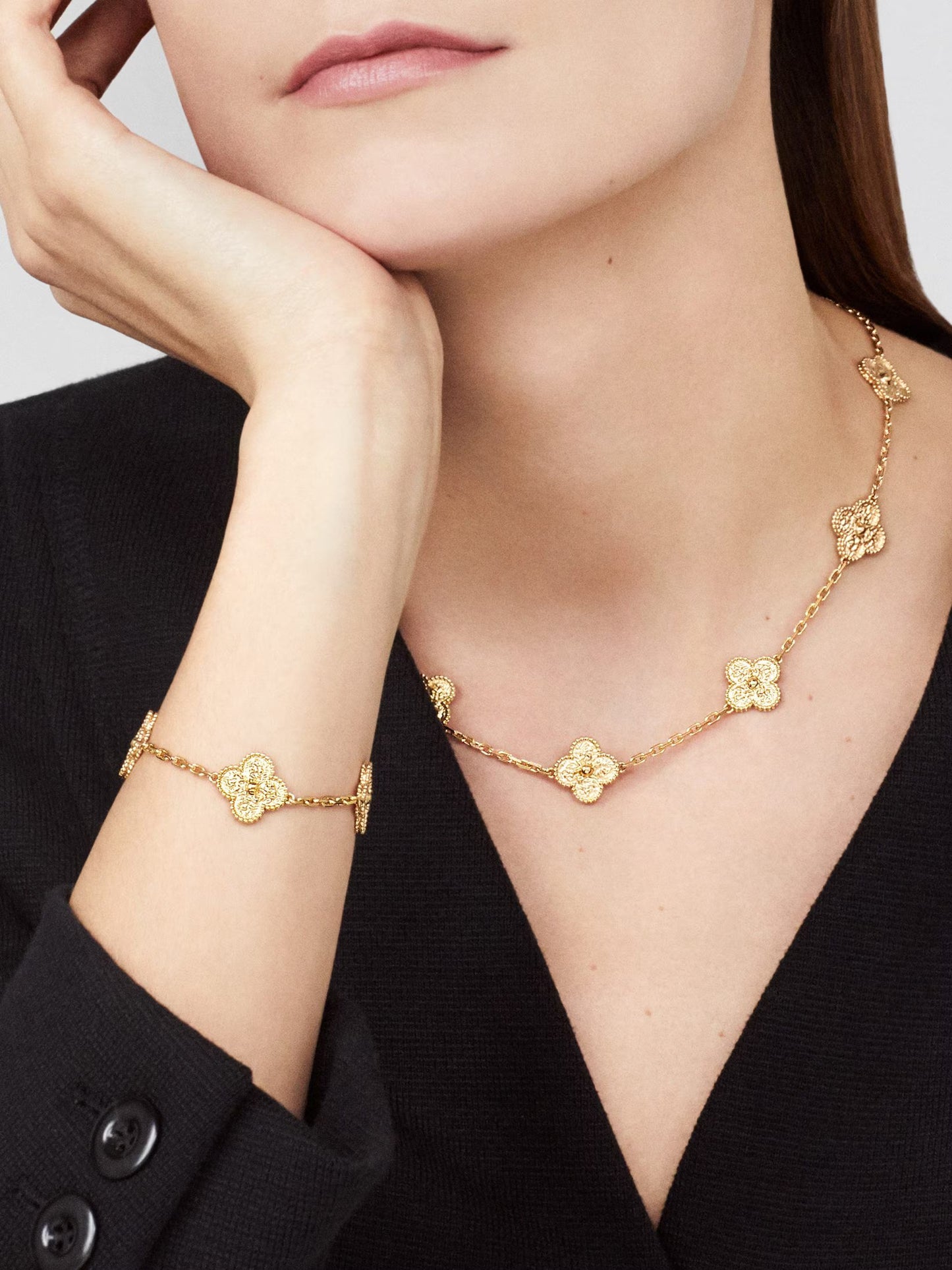 Vintage Alhambra necklace, 10 motifs, textured 18K yellow gold.