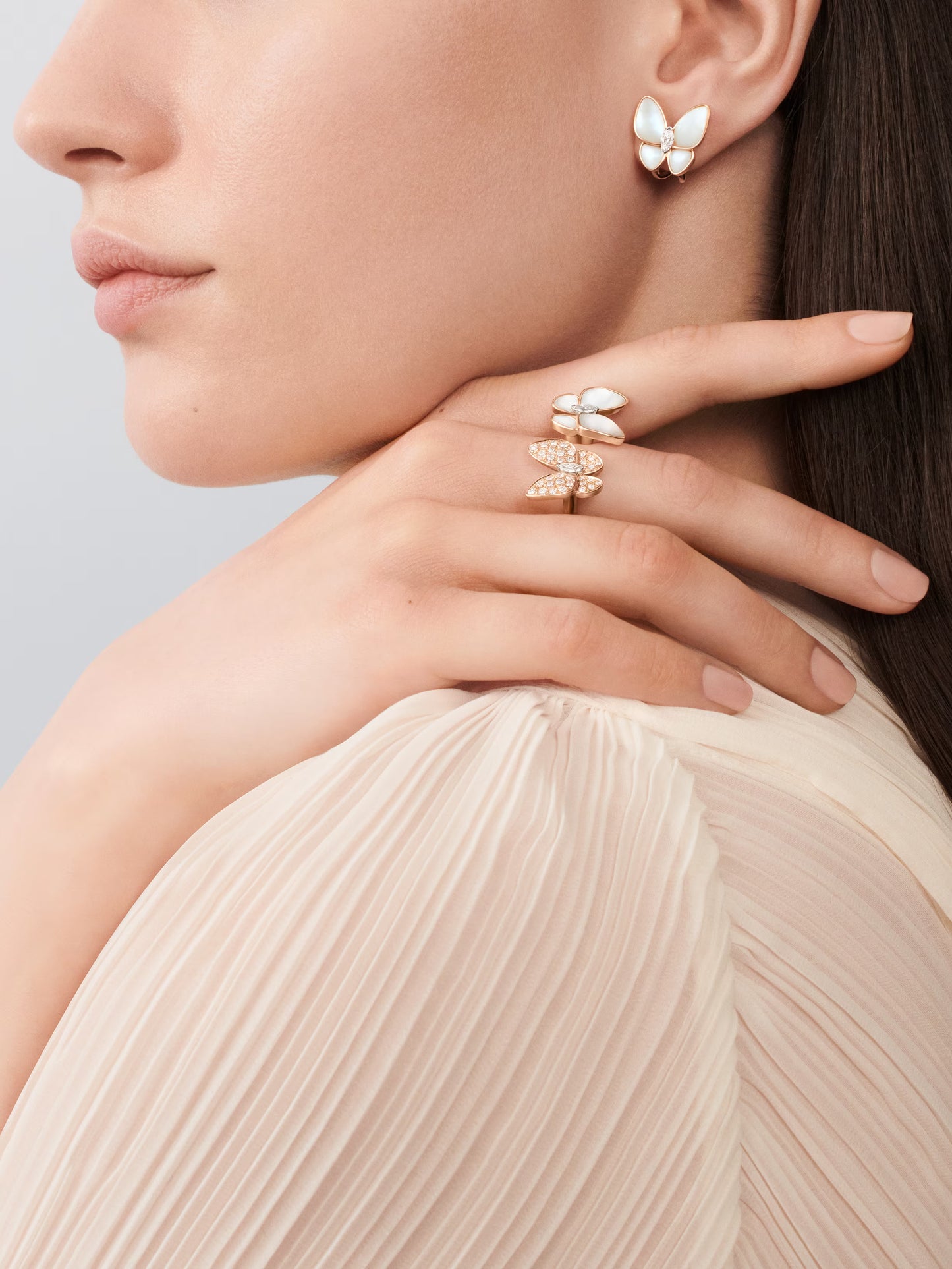 Two Butterfly earrings, 18K rose gold, white mother-of-pearl, rhodium plated 18K white gold, marquise-cut diamonds