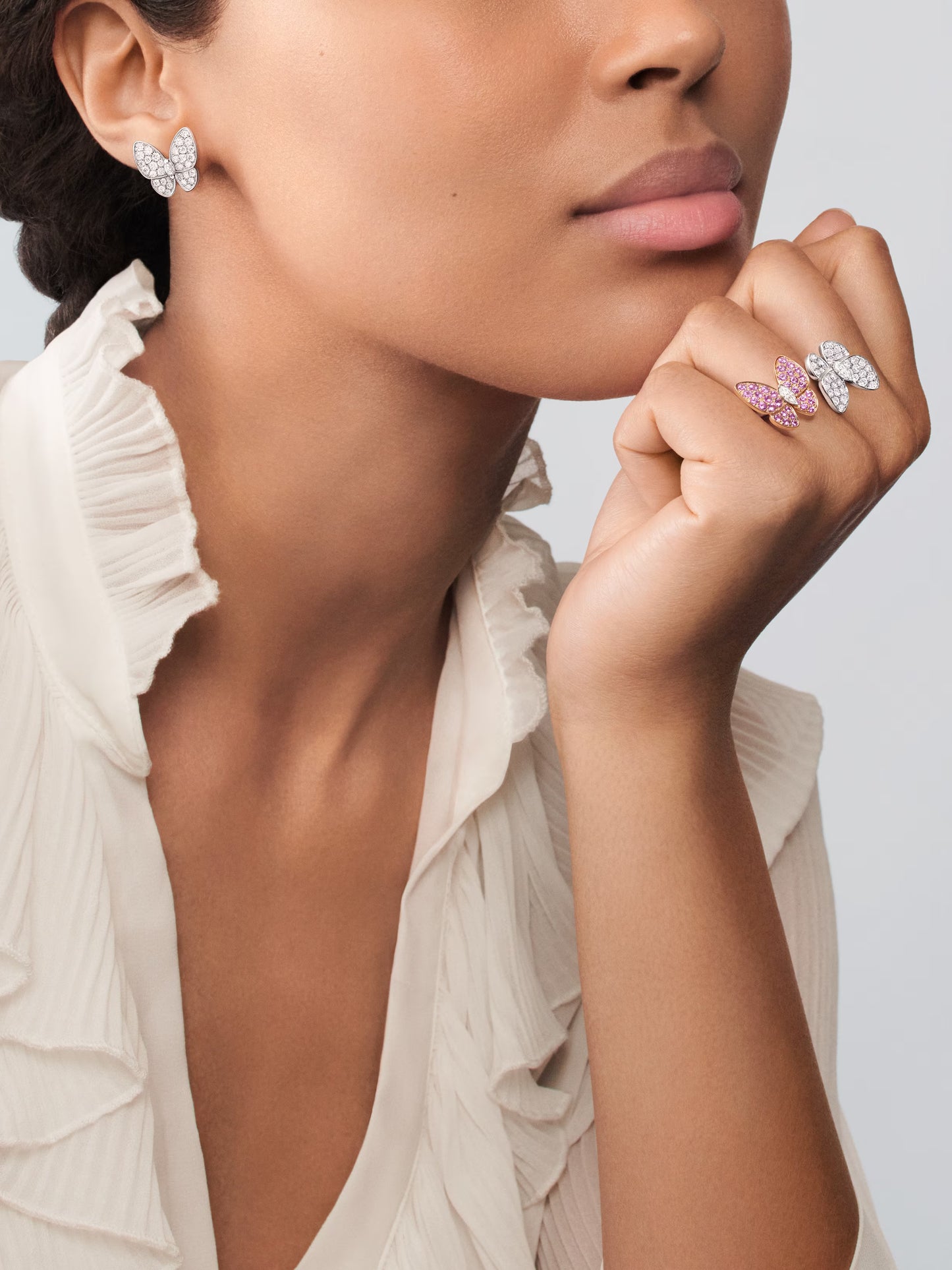 Two Butterfly earrings, 18K rose gold, round pink sapphires, rhodium plated 18K white gold, round and marquise-cut diamonds.