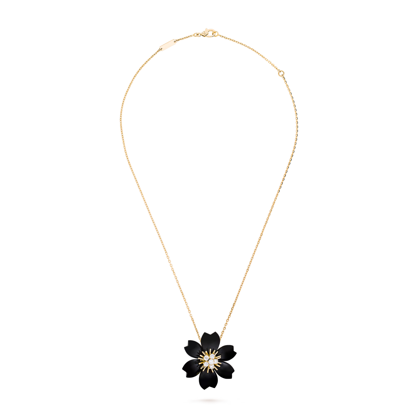 Rose de Noël clip pendant, small model, 18K yellow gold, onyx, round diamonds.