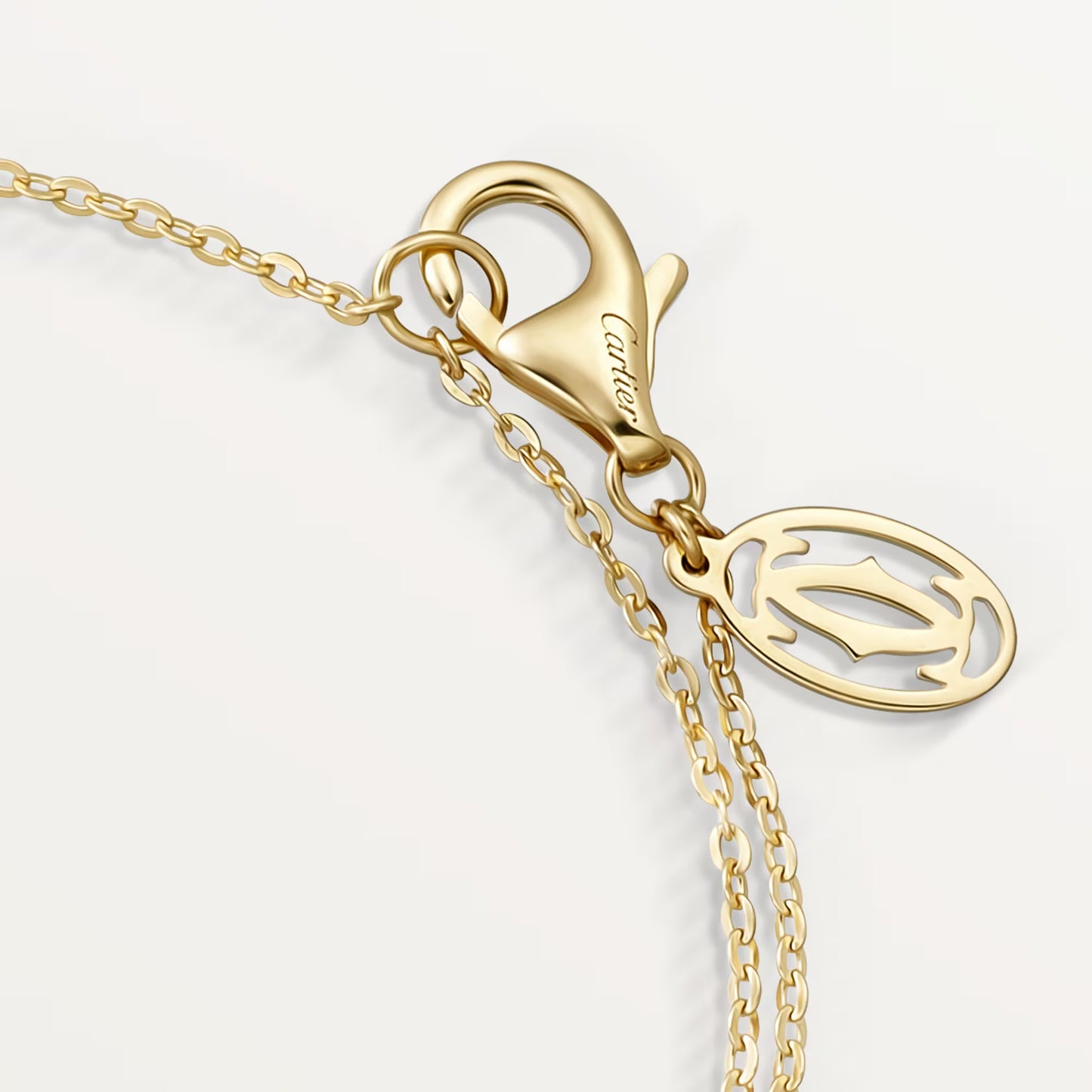 Trinity bracelet 18K white, yellow and rose gold, on chain, diamonds.