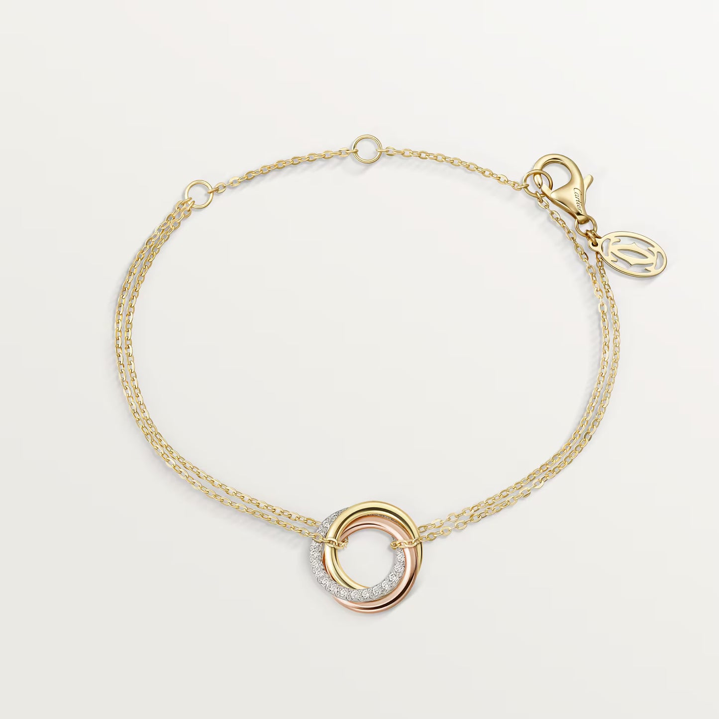 Trinity bracelet 18K white, yellow and rose gold, on chain, diamonds.