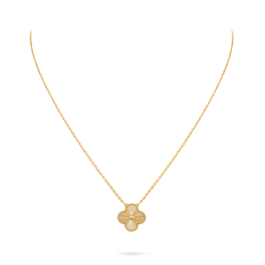 Vintage Alhambra pendant, guilloché 18K yellow gold.