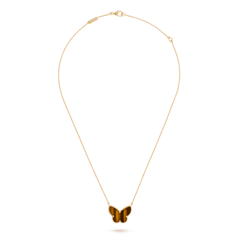 Lucky Alhambra butterfly pendant, 18K yellow gold, tiger’s eye.
