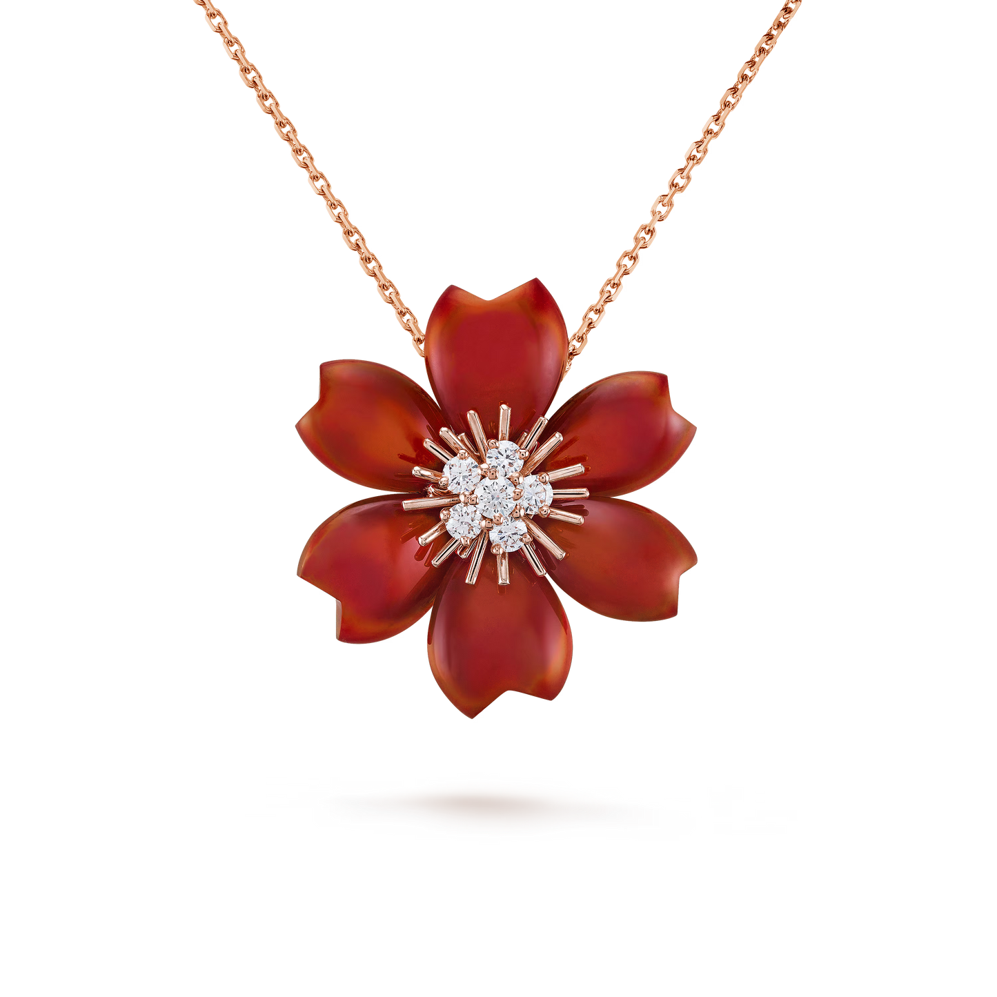 Rose de Noël clip pendant, small model, 18K rose gold, carnelian, round diamonds.