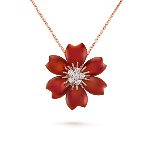Rose de Noël clip pendant, small model, 18K rose gold, carnelian, round diamonds.