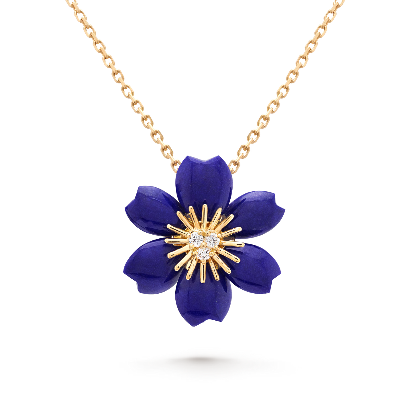 Rose de Noël pendant, mini model, 18K yellow gold, lapis lazuli, round diamonds.