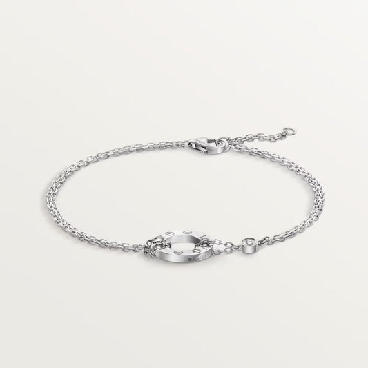 LOVE bracelet 18K white gold, on chain, 2 diamonds.