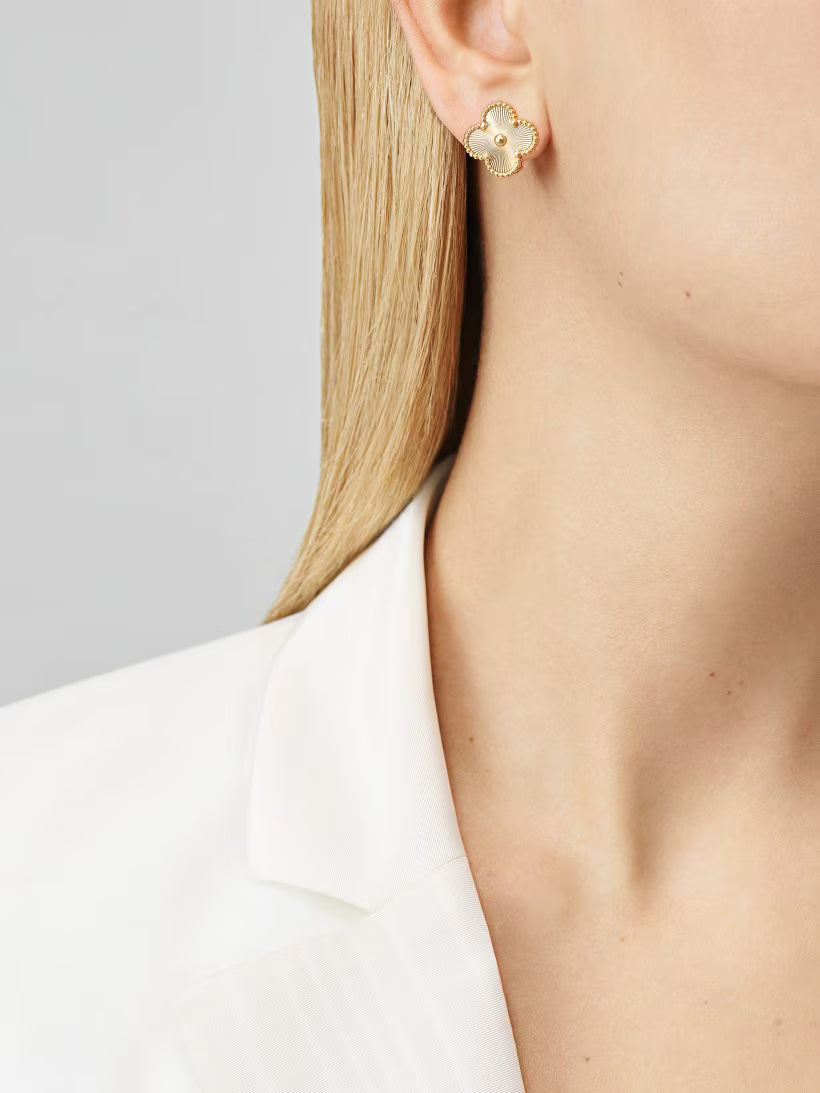 Vintage Alhambra earrings, guilloché 18K yellow gold.