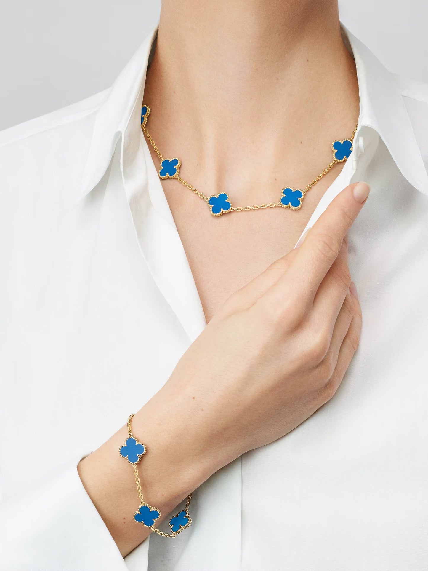 Vintage Alhambra necklace, 10 motifs, 18K yellow gold, blue agate.
