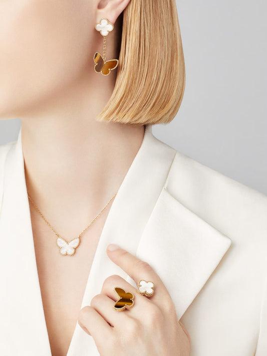 Lucky Alhambra butterfly pendant, 18K yellow gold, white mother-of-pearl.