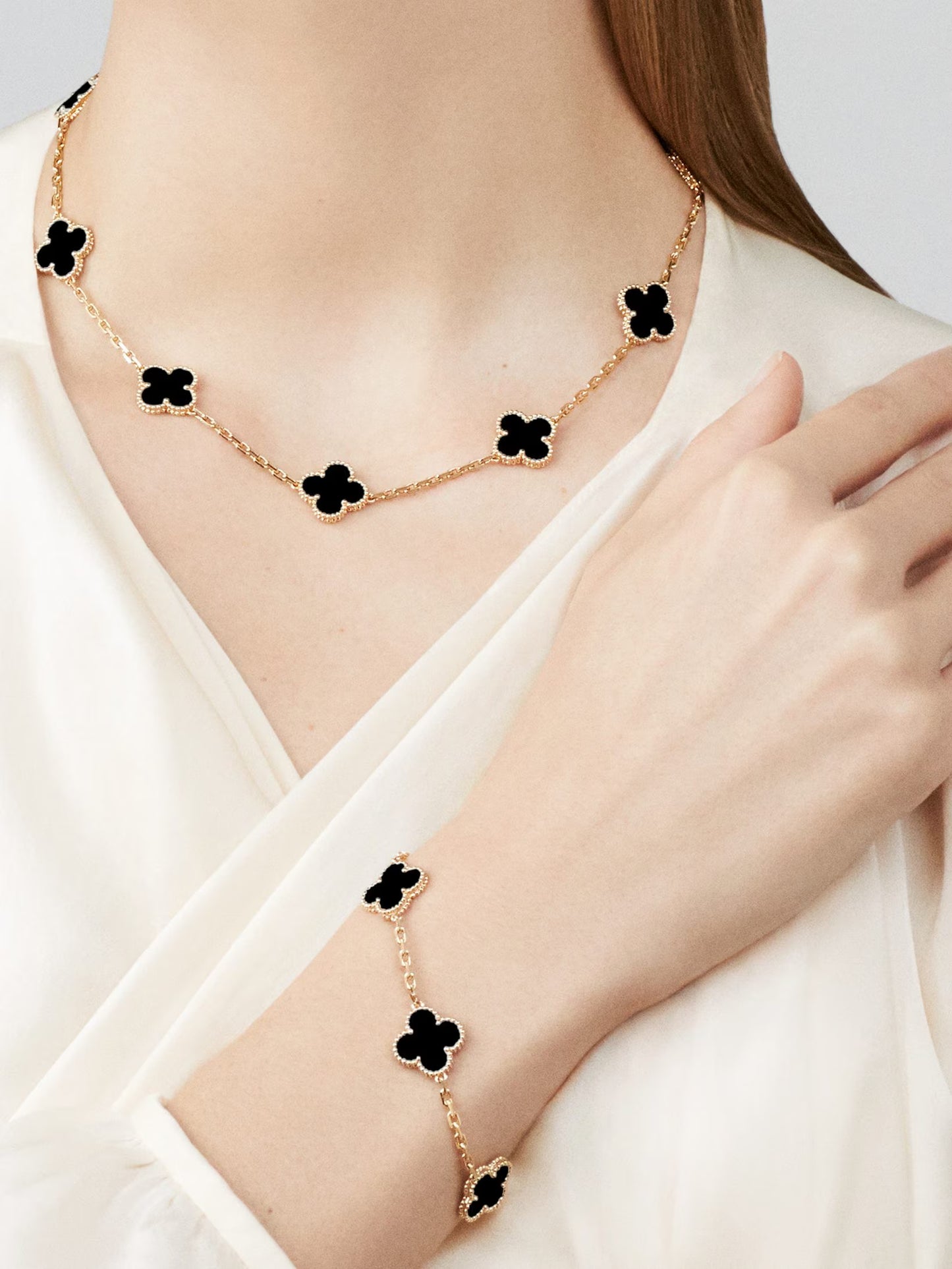 Vintage Alhambra necklace, 10 motifs, 18K yellow gold, onyx.