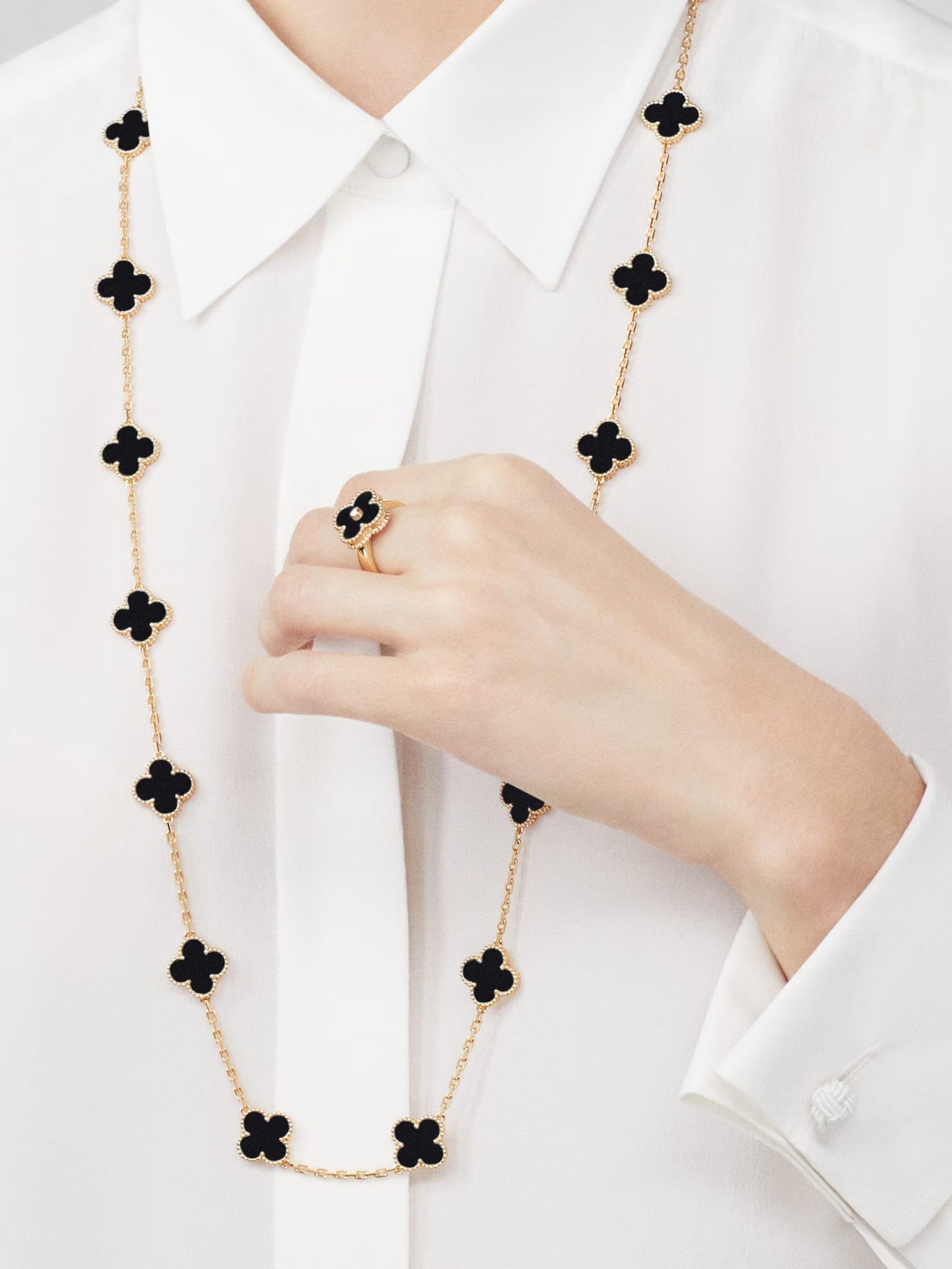 Vintage Alhambra long necklace, 20 motifs, 18K yellow gold, onyx.