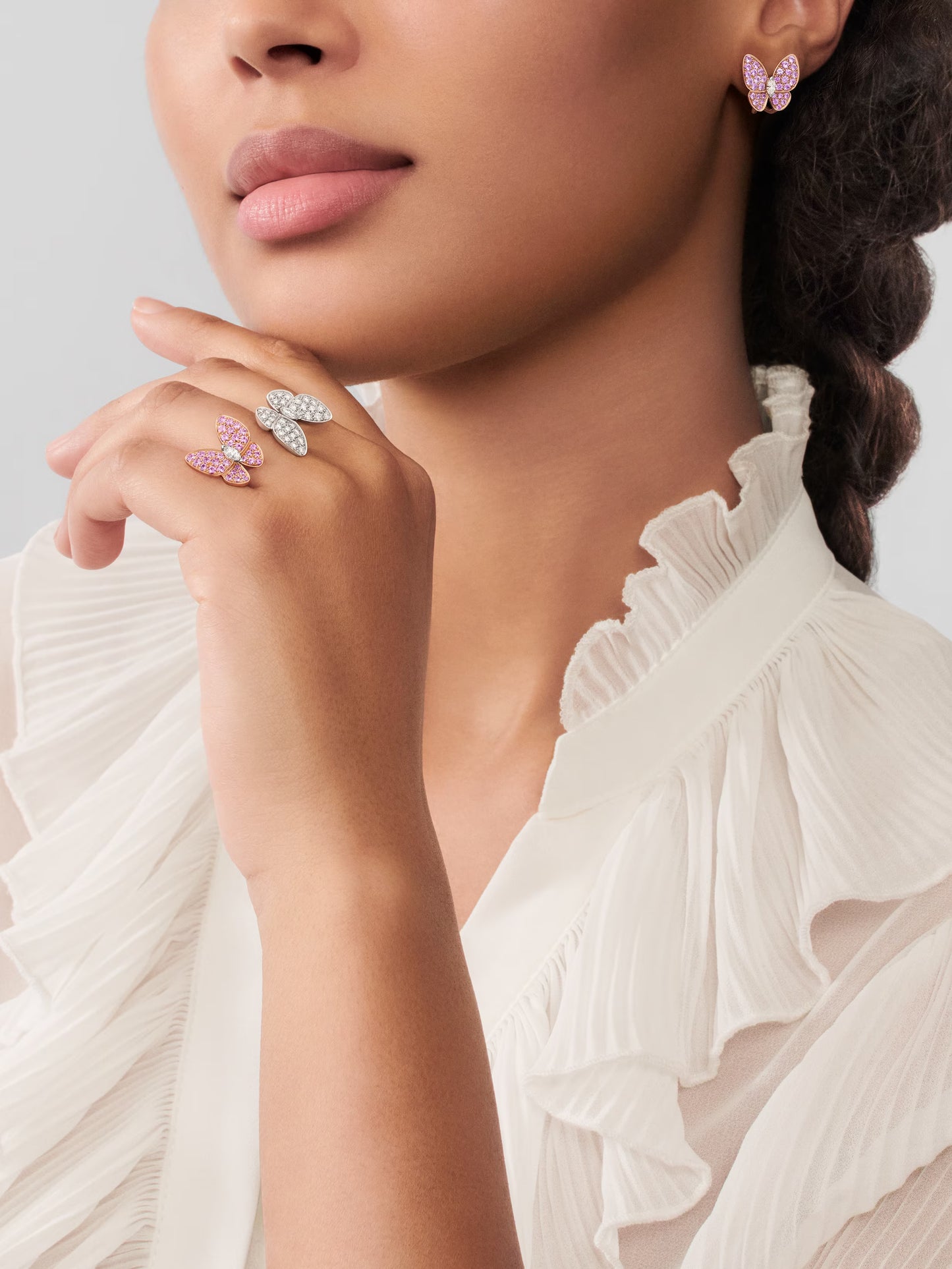 Two Butterfly earrings, 18K rose gold, round pink sapphires, rhodium plated 18K white gold, round and marquise-cut diamonds.