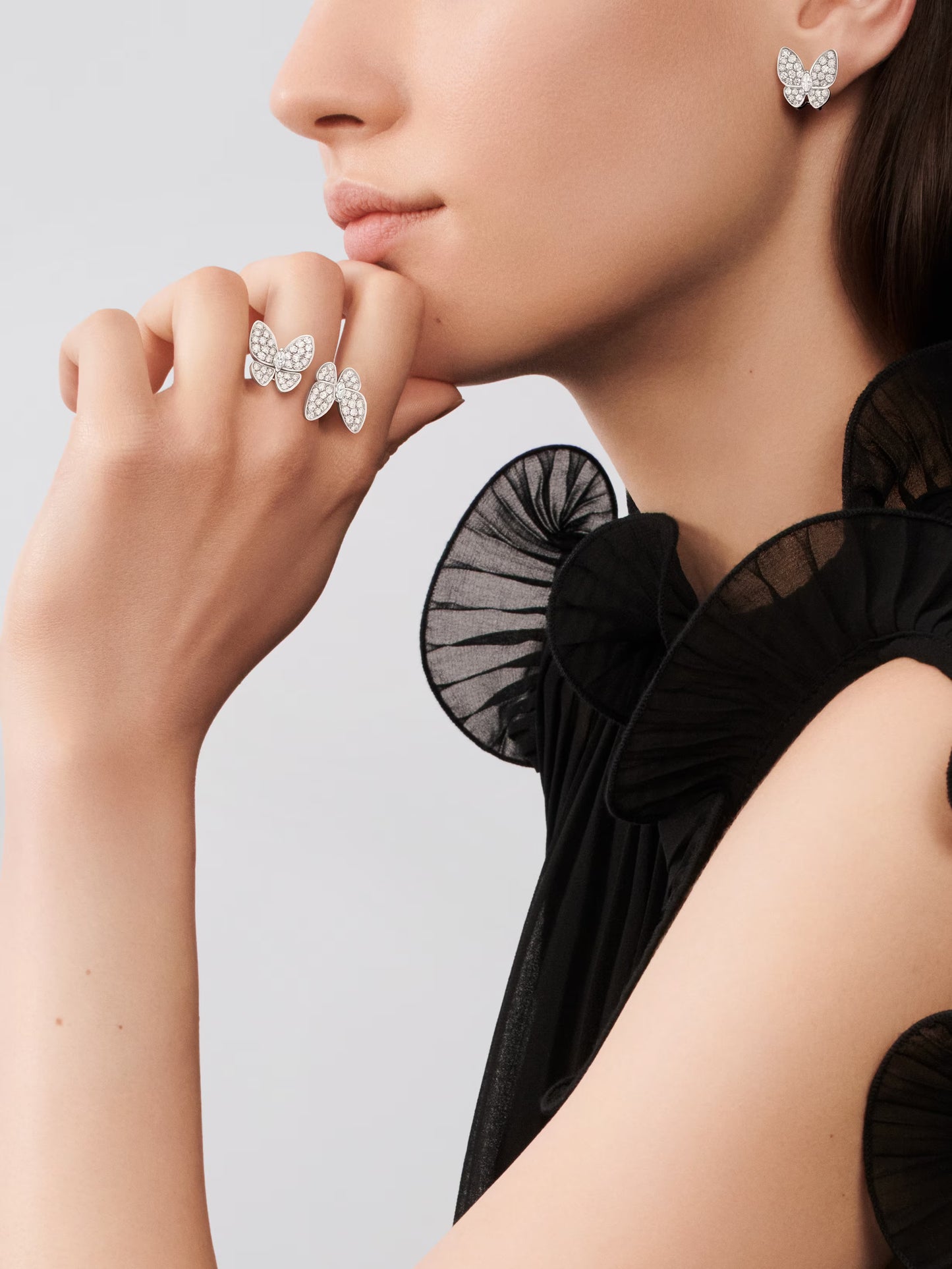 Two Butterfly earrings, rhodium plated 18K white gold, round and marquise-cut diamonds.