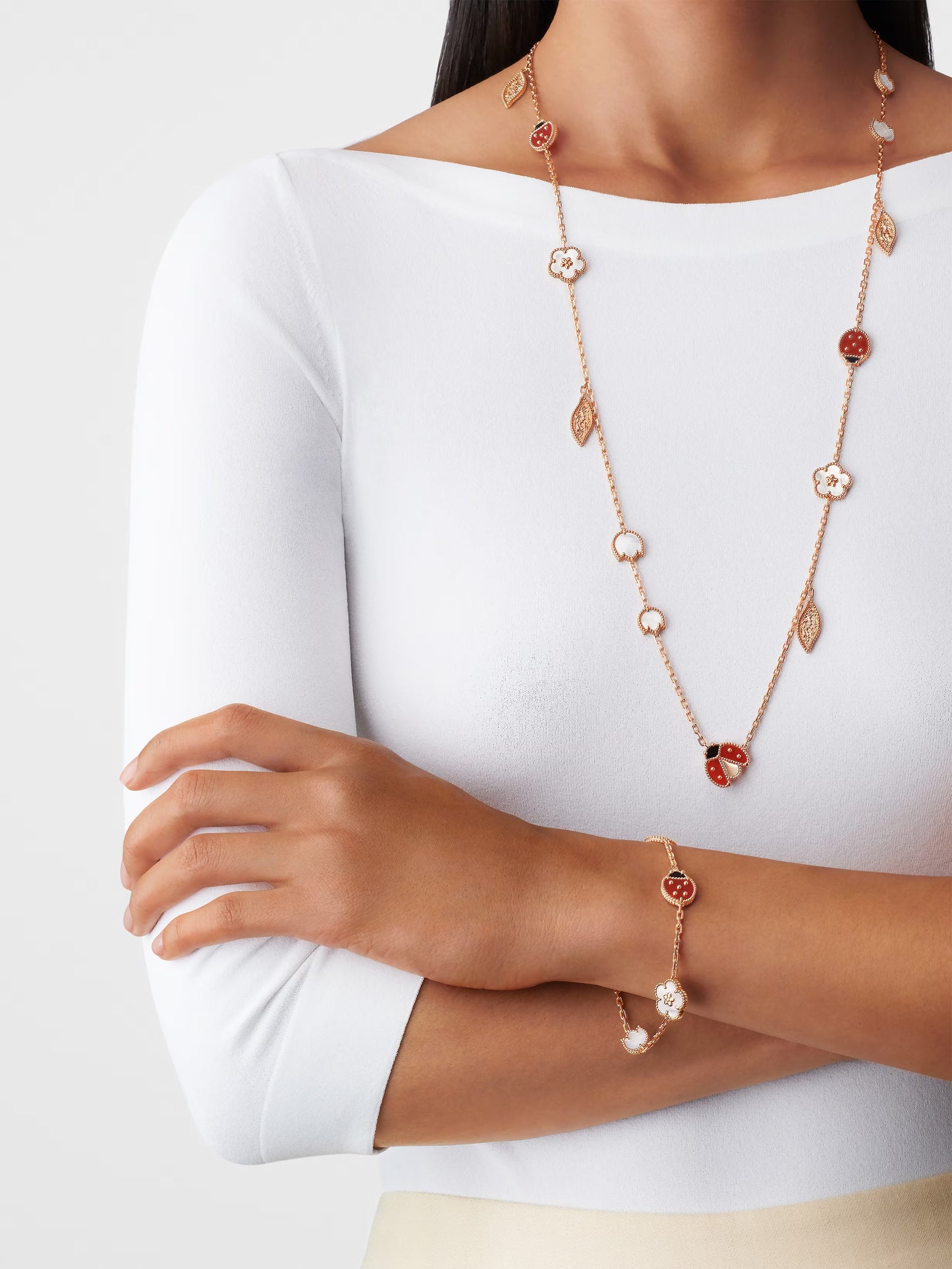 Lucky Spring bracelet, 5 motifs, 18K rose gold, white mother-of-pearl, carnelian, onyx.