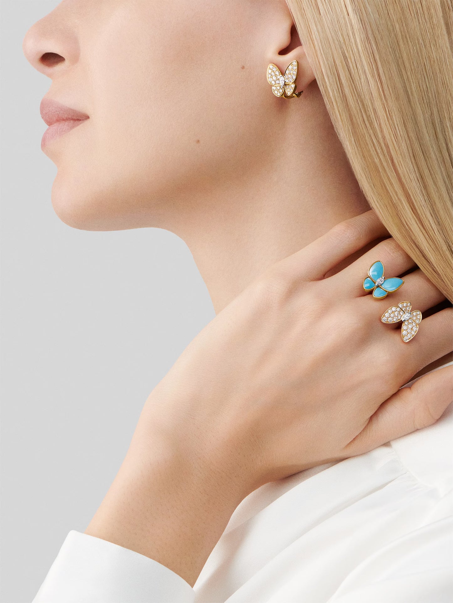 Two Butterfly earrings, 18K yellow gold, turquoise, rhodium plated 18K white gold, round and marquise-cut diamonds.