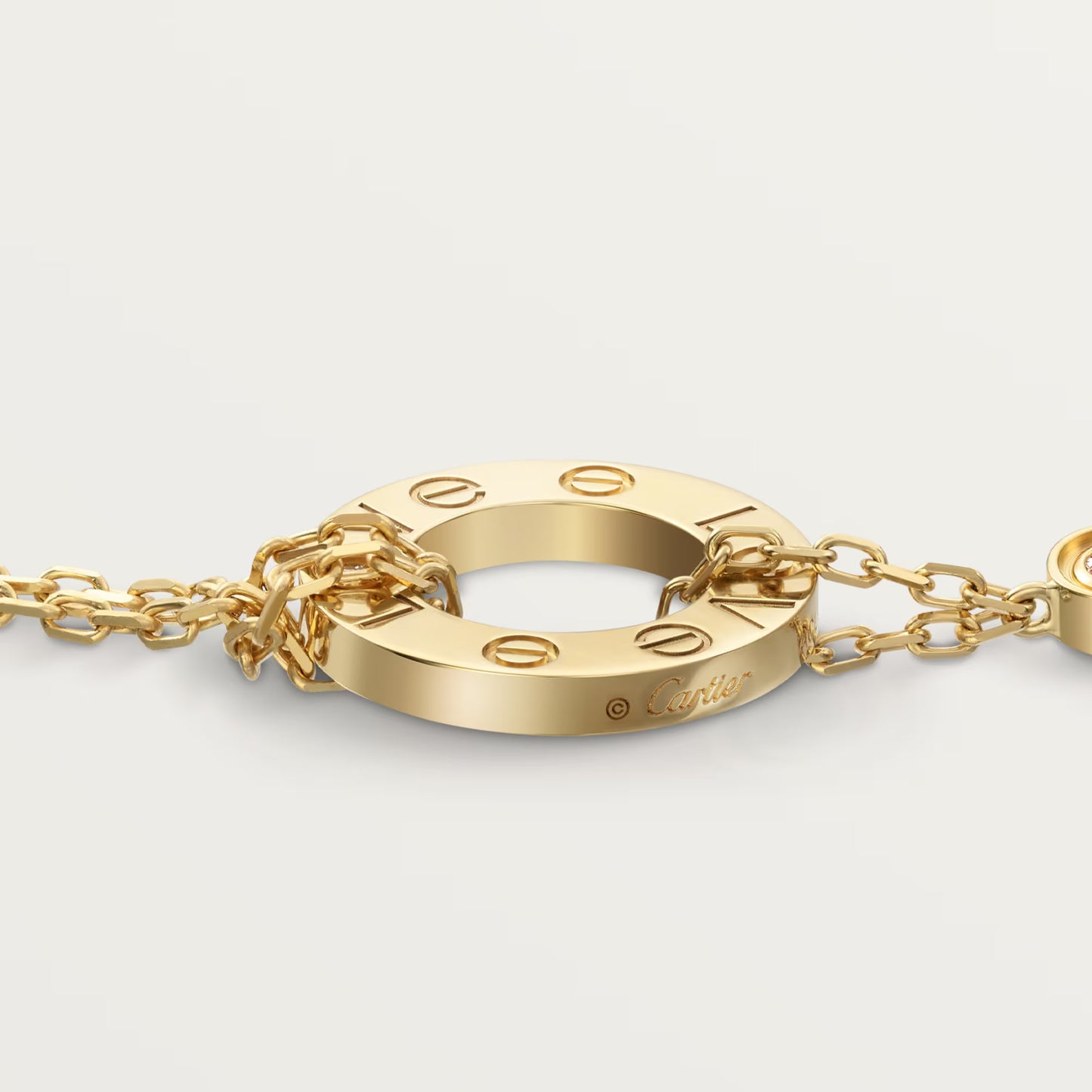 LOVE bracelet 18K yellow gold, on chain, 2 diamonds.