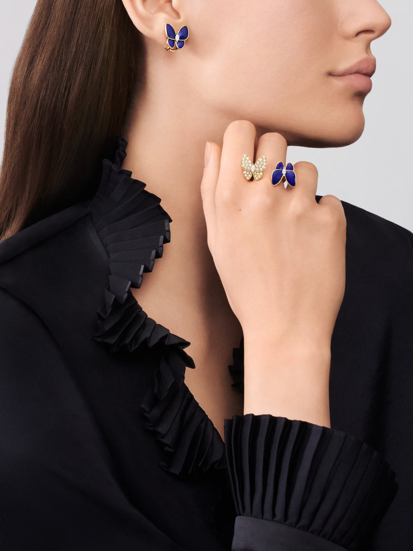 Two Butterfly earrings, 18K yellow gold, lapis lazuli, rhodium plated 18K white gold, round and marquise-cut diamonds.