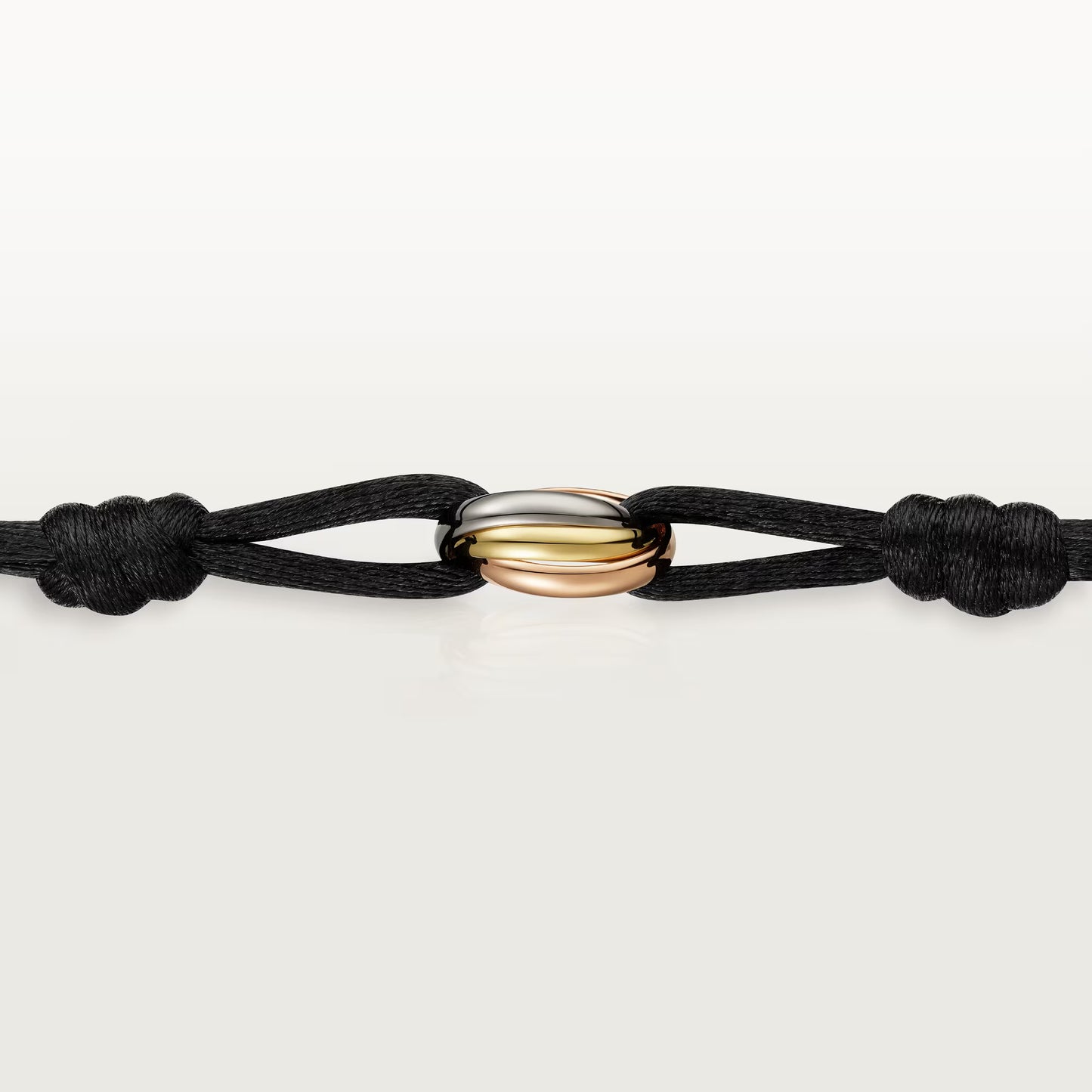 Trinity 18K white, rose and yellow gold bracelet.