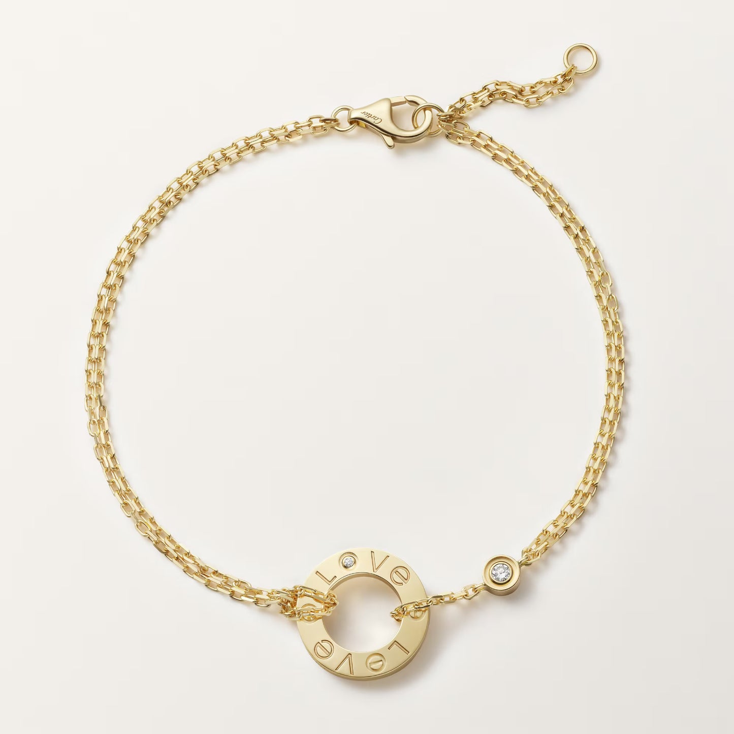LOVE bracelet 18K yellow gold, on chain, 2 diamonds.