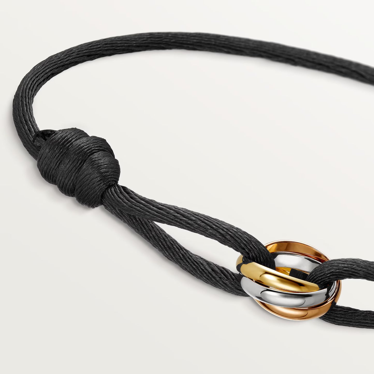 Trinity 18K white, rose and yellow gold bracelet.