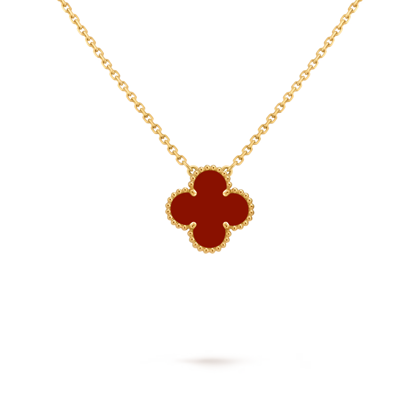 Vintage Alhambra pendant, 18K yellow gold, carnelian.