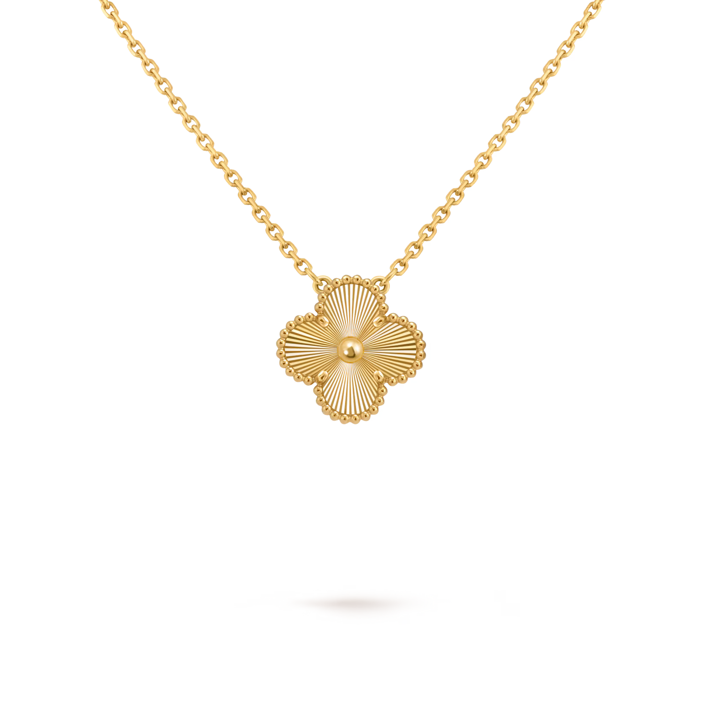 Vintage Alhambra pendant, guilloché 18K yellow gold.