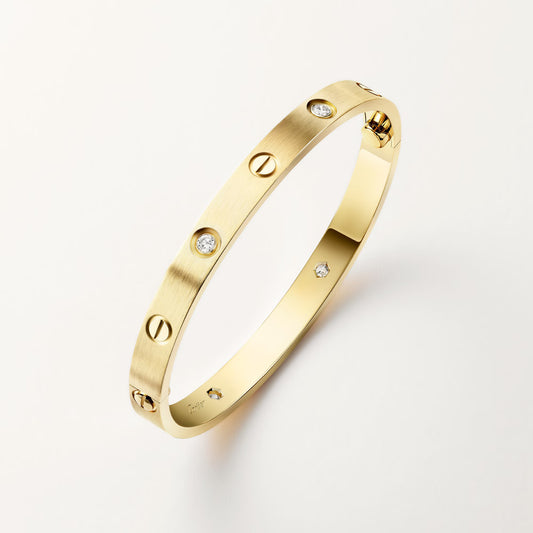 LOVE bracelet 18K yellow gold, classic model, brushed, 4 diamonds.