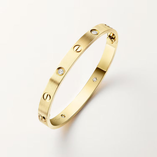 LOVE bracelet, classic model, brushed, 4 diamonds. 18k GOLD