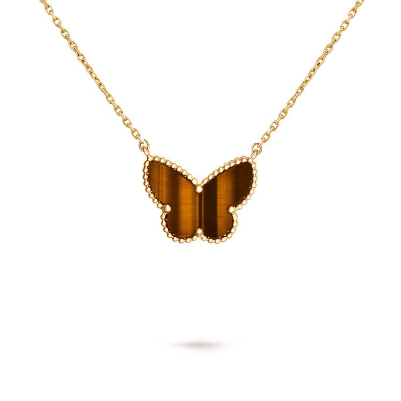 Lucky Alhambra butterfly pendant, 18K yellow gold, tiger’s eye.